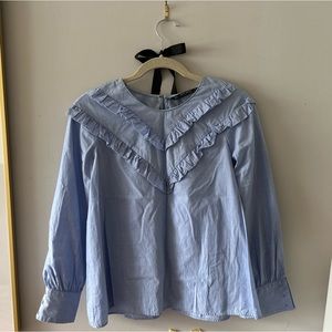 Zara light blue blouse.